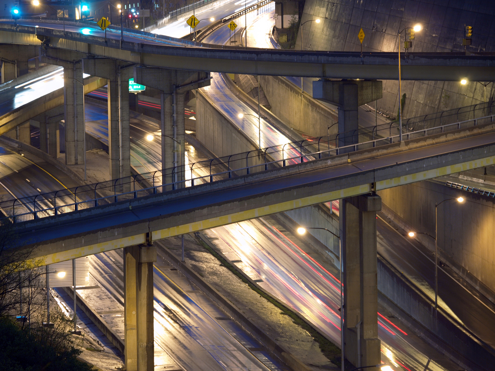 Rain slick Pittsburgh freeway bridges at night.